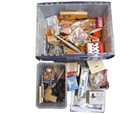A box containing model aircraft props, wheels, sparklets, empty engine boxes, etc.Qty: 1 box