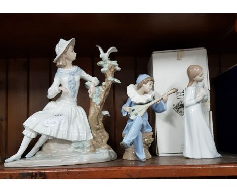 Nao - large, unusual figurine of a woman with hat watching a dove in a tree together with â€˜Strummingâ€™ (no.1078) and a box
