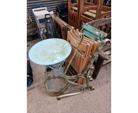 4 folding wooden chairs, 2 folding metal chairs with table &amp; metal bench ends with middle support.