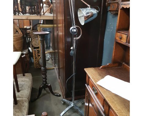 A vintage aluminium adjustable angle floor standing lamp. 