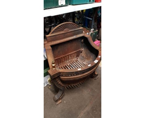 A cast iron fire grate 