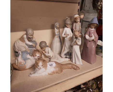 Eight Nao figures and another 