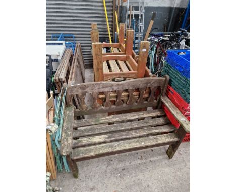 A wooden garden bench and four chairs. 