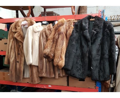 Five fur coats and a faux fur including white mink, red fox, pale mink (x2).Black fur has two or three thin patches to the ed