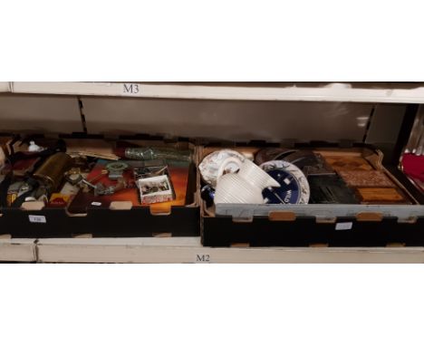 Two boxes of collectables inc. money boxes, bus ticket machine etc.