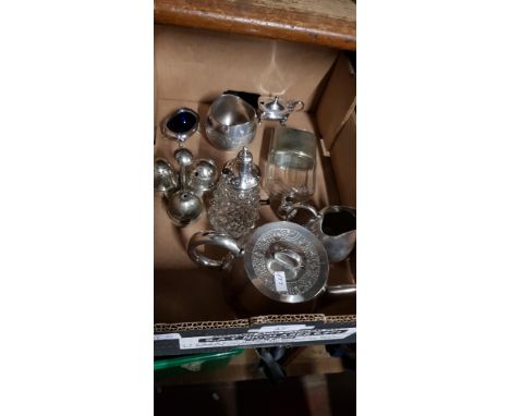 A box of silver plated items including Dresser style cruet, lamp, teaset, hip flask etc