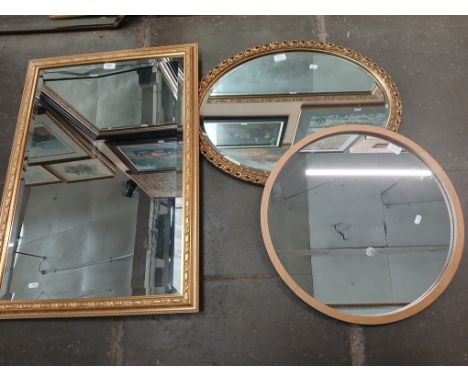 Two gilt framed mirrors and an M&amp;S light oak framed mirror. 