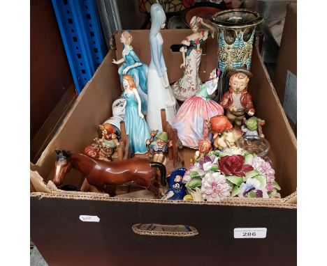 A box of mainly figurines including Royal Doulton, Hummel etc. Also includes vase and ceramic posy..One Hummel piece, Boy on 