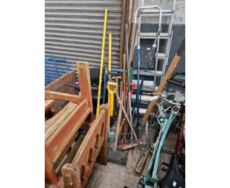 A group of assorted garden tools 