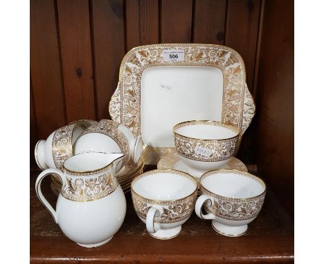 Wedgwood Gold Florentine 21 piece tea set - 6 cups & saucers, side plates, milk jug, sugar basin and bread & butter plate. Co