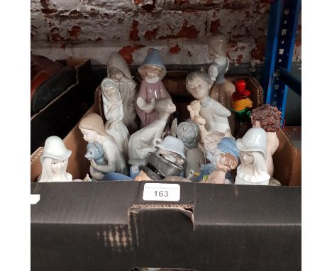 A box of figurines including Nao 