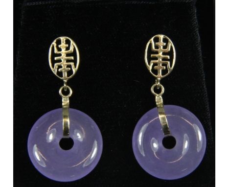 A pair of Chinese lavender jade earrings mounted on yellow metal (tested 9ct gold)