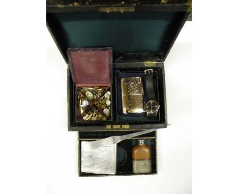 A vintage leather jewellery box and contents