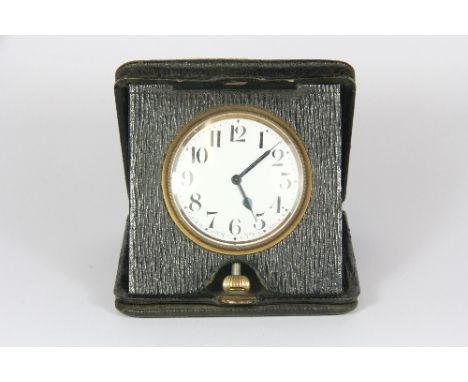 A vintage travelling alarm clock