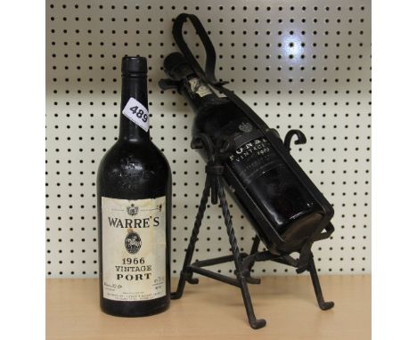 A wrought iron port pourer together with a bottle of vintage port and an 1966 (empty) vintage port bottle