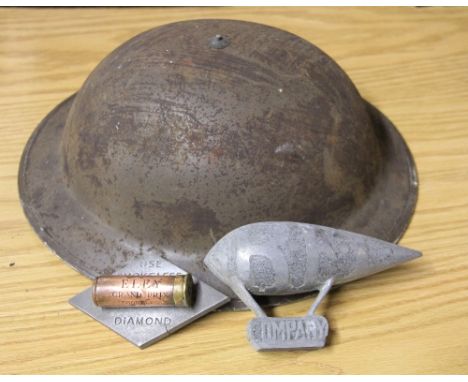 A WWII helmet and 2 other advertising items