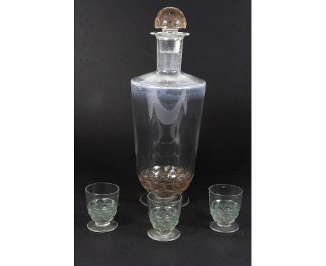 A lovely R.Lalique decanter and 3 glasses decorated with leaping fish