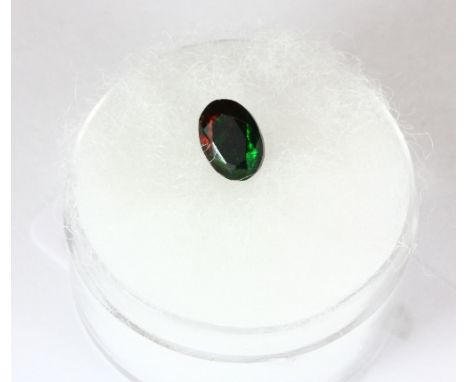 A 7mm x 5mm Ethiopian black opal (approx 5.3ct)