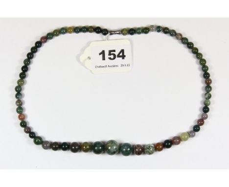 A graduated necklace of mixed colour jade/hardstone beads