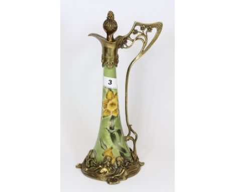 An Art Nouveau style ceramic jug with metal mounting H 33cm