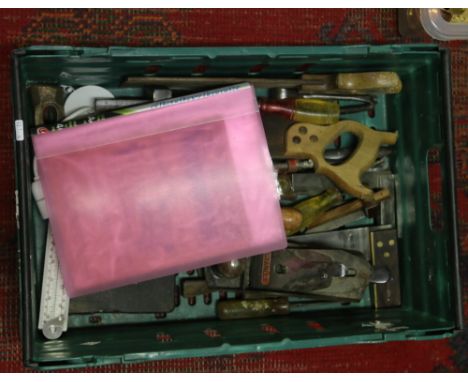 A box of assorted woodworking tools to include Stanley plane, saws, chisels and an album of Antique Woodworker Magazines.