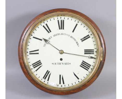 An oak cased circular wall clock with fusee movement enamel face marked for Newport Abergaveny iron works South Wales.