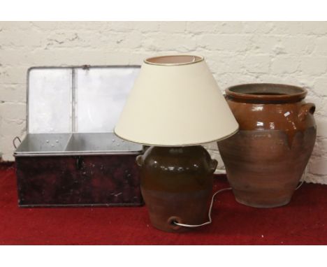 A painted tin storage trunk along with a large stone pot and another stoneware jar converted to electric.