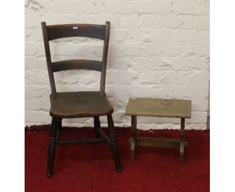 A childs oak chair along with a pegged and jointed foot stool.