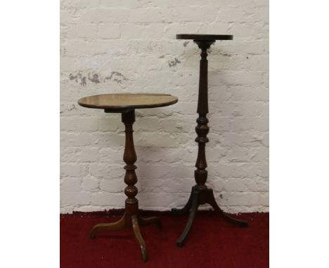 A mahogany tripod wine table along with a turned mahogany plantstand.
