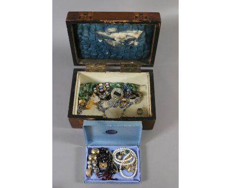 A Victorian marquetry work box and contents of costume jewellery to include Christian Dior, Trifari and Givenchy examples.