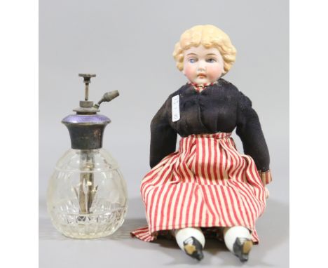 A Sterling silver and purple enamel topped perfume atomizer with cut glass base along with a bisque headed doll.