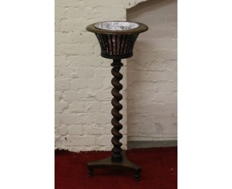A Victorian mahogany barleytwist pierced basket planter.