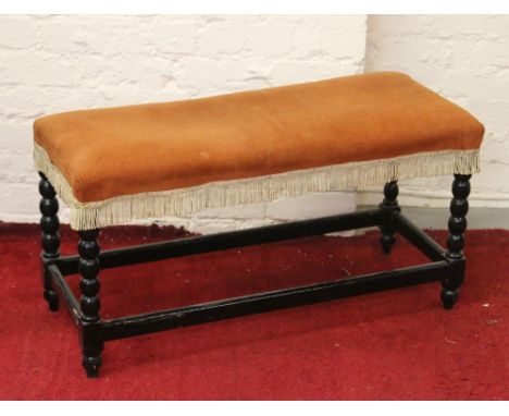 An ebonized bobbin turned duet stool.