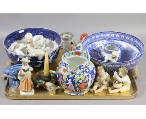 A tray of collectables, crested ware, Sylvac top hat, Gouda chamber stick, Mailing blue and white fruit bowl.