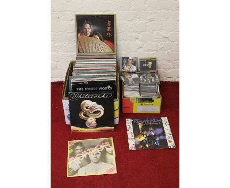 A collection of LP records and compact discs to include Whitesnake and Elvis Presley.