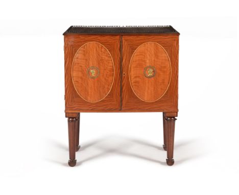 A Regency partridgewood collectors cabinet, circa 1815, in the manner of George Bullock, the rectangular top with pierced bra