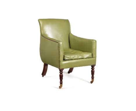 A Regency mahogany and green leather upholstered library armchair, circa 1815, in the manner of William Trotter,  with brass 