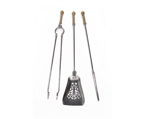 A set of Regency steel and brass mounted fire tools, circa 1820, in Orientalist taste, comprising shovel, poker and tongs, th