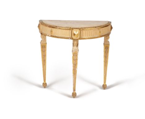 A cream painted and parcel gilt semi elliptical console table , late 18th century, possibly by an émigré maker, the veined ye