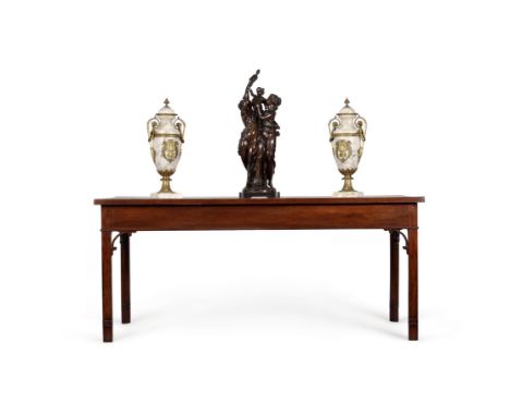 A George III mahogany hall table, circa 1780, the rectangular top above a plain frieze, on square section legs headed by pier