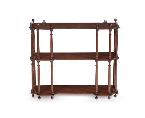 A pair of George III mahogany sets of hanging shelves, circa 1800, each with three inverted breakfront shaped tiers supported