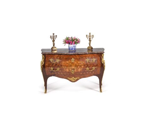 A Louis XV tulipwood, specimen marquetry and parquetry serpentine commode, stamped * A LAPIE, circa 1760, gilt metal mounted 