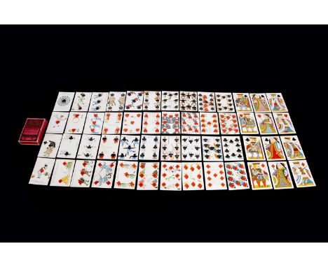 A rare Tiffany & Co Harlequin tranformation playing cards circa 1879, designed by C.E. Carryl, complete set of fifty-two card