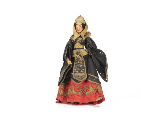 A fine late 19th century Venetian queen or witch puppet,  with composition head and jointed wooden body, strong features with
