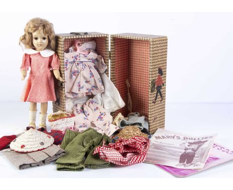 A Mary Hoyer composition doll and trunk 1930-40s, with brown lashed sleeping eyes and strawberry blonde wig —14 3/4in. (37.5c