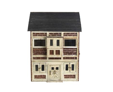 A painted wooden dolls’ house circa 1900, with brick finish, central front door with No.7 and large brass knocker, suspended 