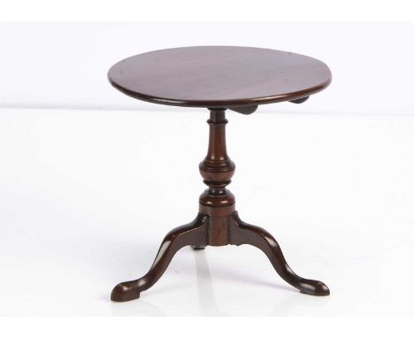 A early 19th century apprentice mahogany tripod table, with tilt-top, turned column and cabriole legs —6 1/2in. (16.5cm.) hig