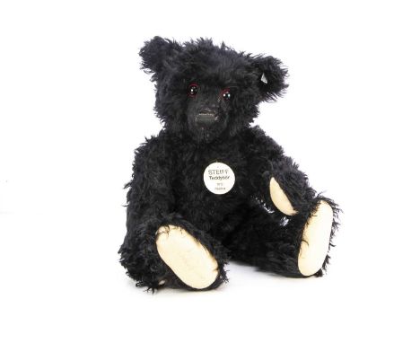 A large Steiff limited edition 1912 replica black teddy bear,  1418 of 1912, signed by Tweed Roosevelt to foot pad, in origin