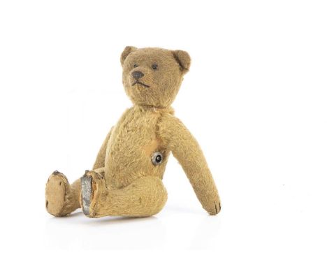 A 1910-20s Gebruder Bing clockwork teddy bear,  a Roller Skater or Walker, with blonde mohair, small black boot button eyes, 