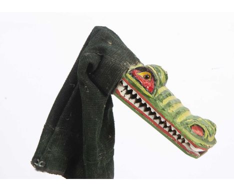 A professional Punch & Judy crocodile puppet from the Vic Taylor and Billy Norman collection, with carved and painted wood an